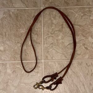 Brown leather roping reins